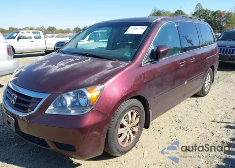 2010 Honda Odyssey Ex-L z USA, uszkodzony, nr VIN 5FNRL3H76AB097872